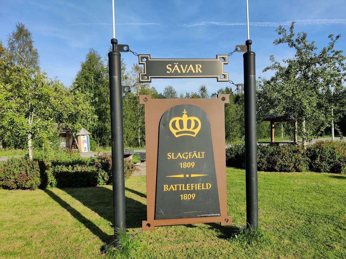 Rastplats Sävar vid väg 363, omgiven av norrländsk skog nära Sävarån norr om Umeå.